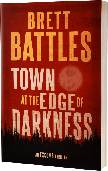 Excoms: Town at the Edge of Darkness